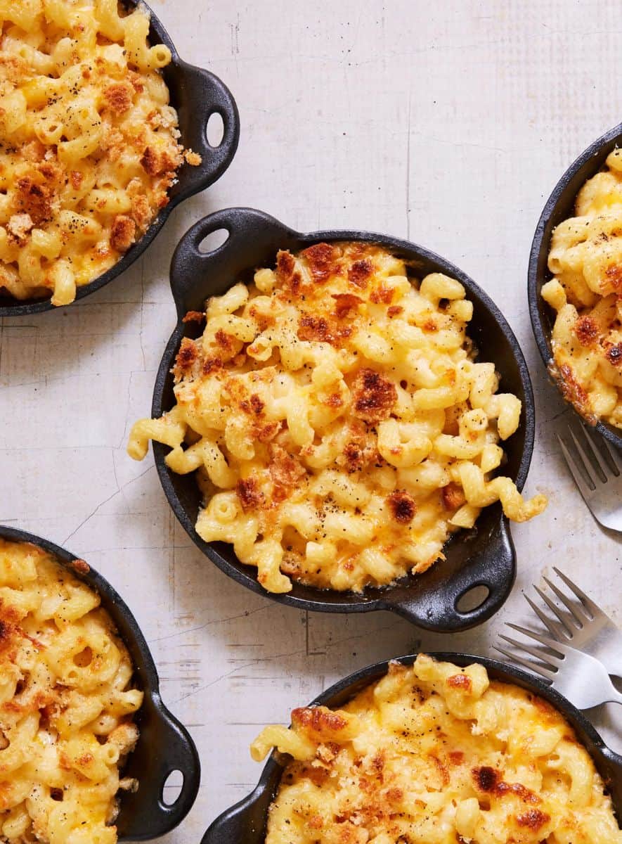 Delicious mac and cheese served in small cast iron skillets.
