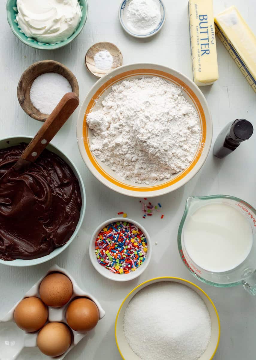 Ingredients for yellow cake with chocolate frosting.